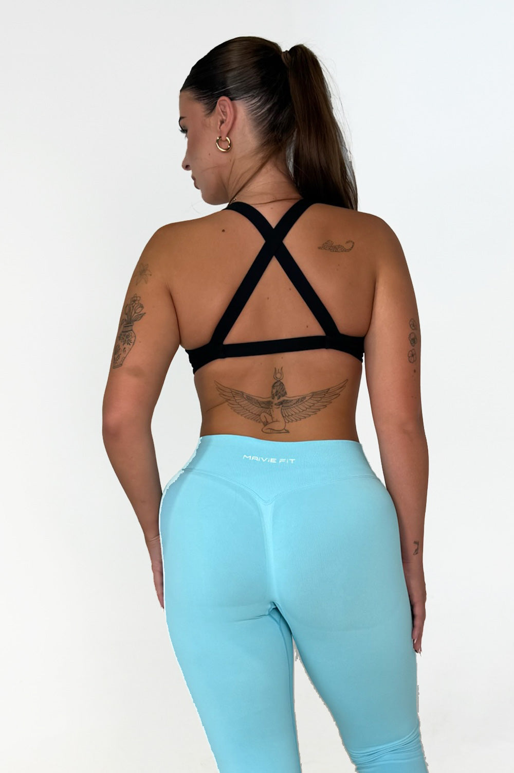 Maivie Fit Twist Crop in Deep Black paired wth Ice Blue Leggings